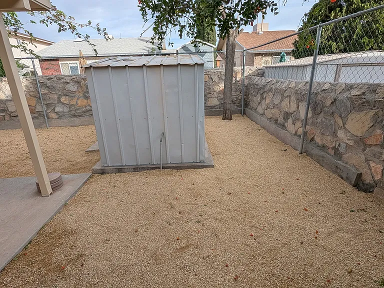 Backyard, shed not available for storage.