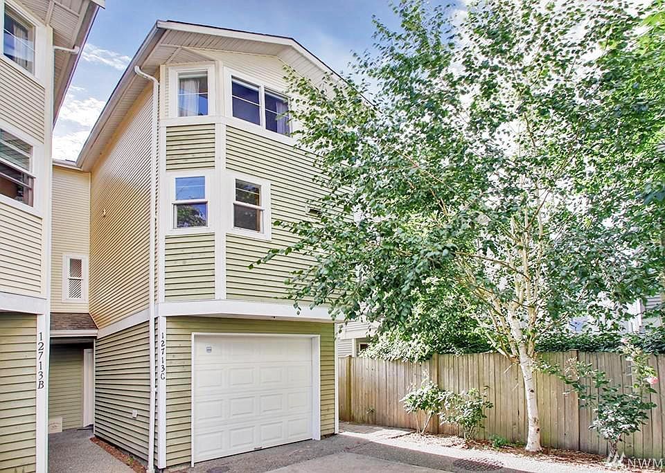 End-unit townhouse with garage & extra privacy