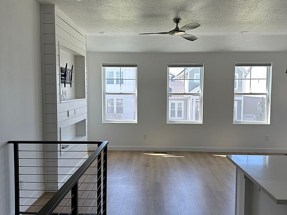 Living room unfurnished with TV wall mount.