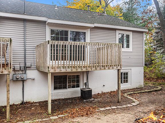 18117 Rear with personal deck from living room