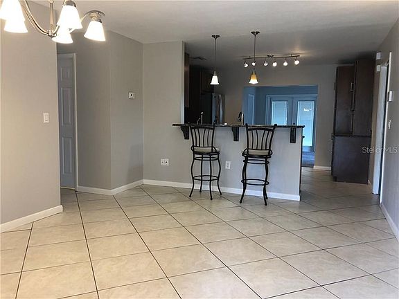 4th image of 6544 Woodland Blvd N