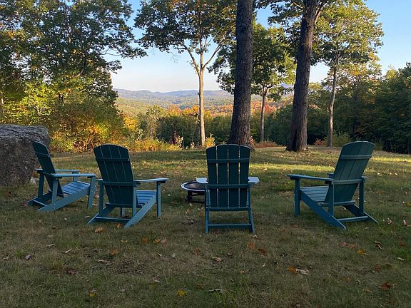 Backyard with firepit and Adirondack chairs, beautiful mountain views!