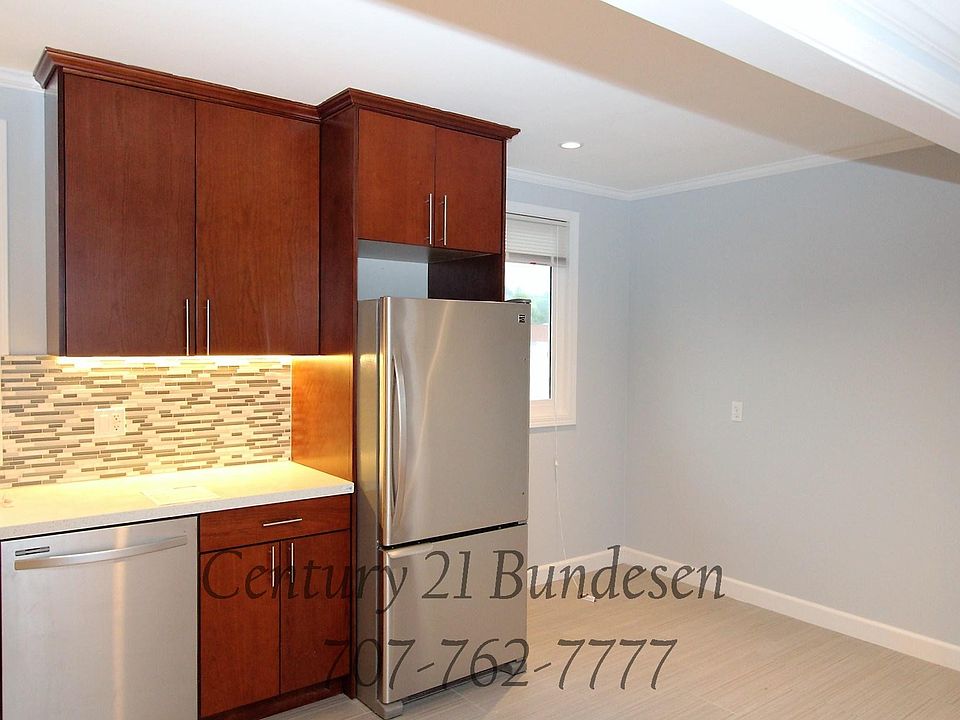 1st image of 106 E 1st St