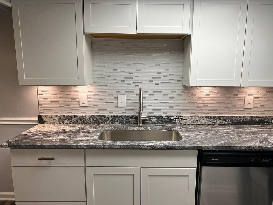 Complete kitchen renovation -- almost done. Left to install are the cabinet door knobs and addition lighting over kitchen sink
