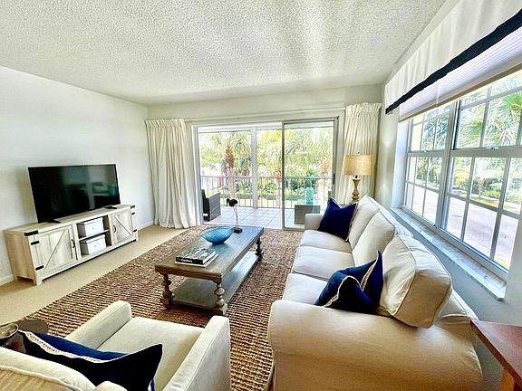 Spacious living area with stackable sliders.