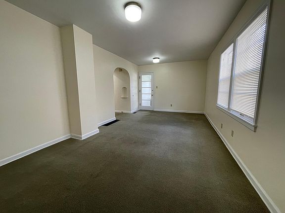 Living room with dining space at end