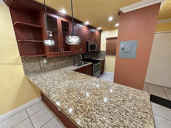 5th image of 6055 W 19th Ave APT 205