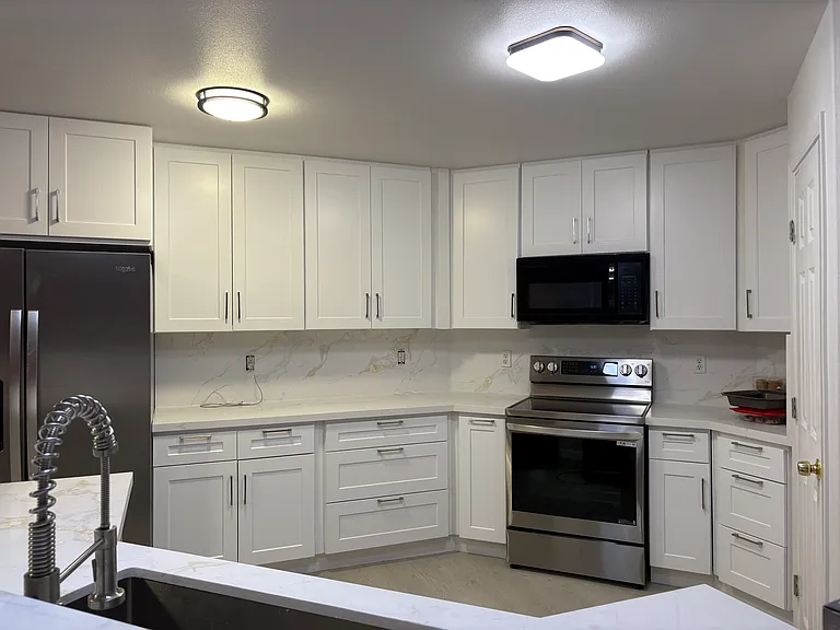 Brand new cabinets, new appliances including LG Stove/Oven, LG Dishwasher and new Vissani Microwave