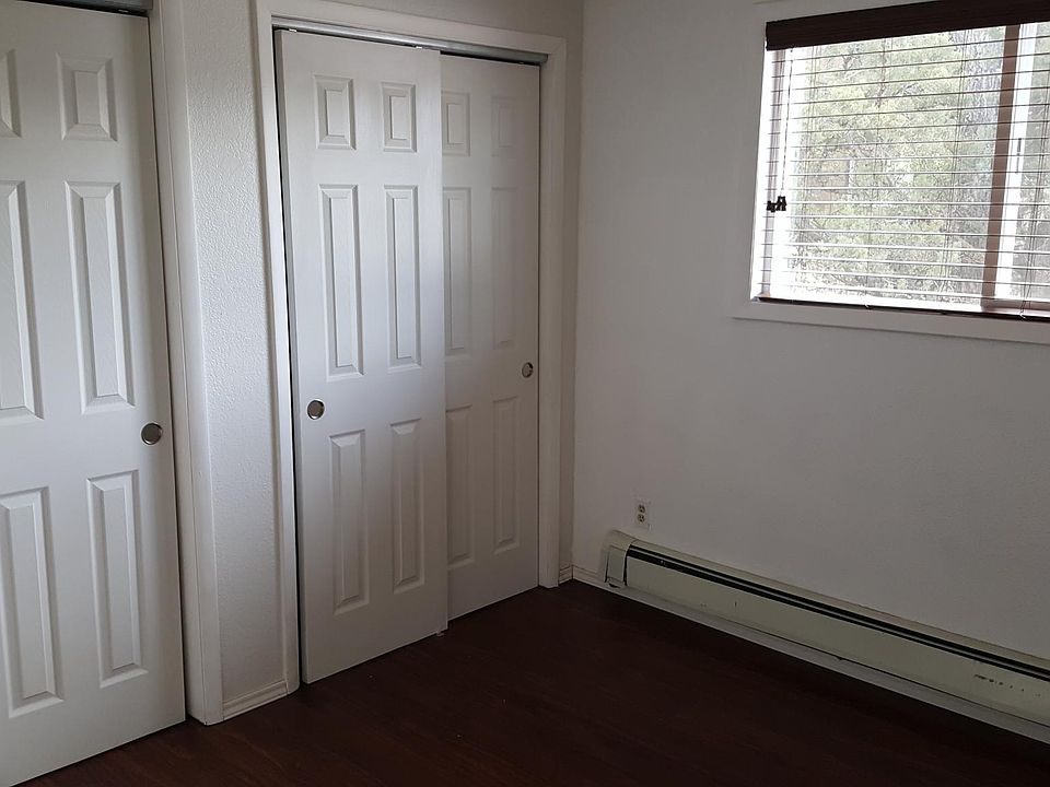 Smaller of the two bedrooms with large double closets
