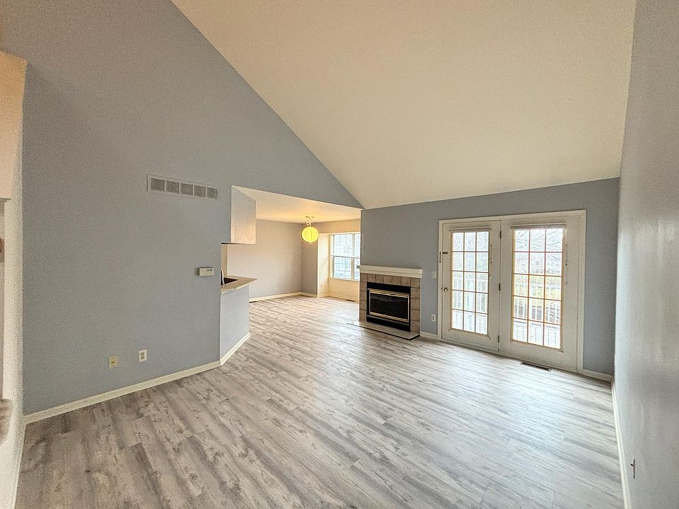 Great room with high ceiling and luxery vinyl plank floor