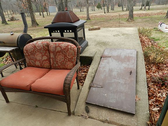 Cellar located just off the back patio for safety during storms.