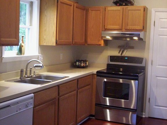 Kitchen, stainless range, & skylight