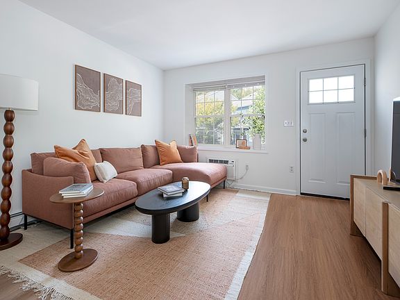 Bright, airy living with all-day sun