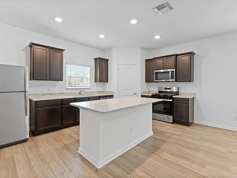 All kitchen appliances come included.