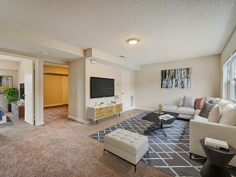 Recently Renovated Townhouse Style Apartments featuring New gray carpet, Neutral paint scheme, Premium hardwood-style flooring, Neutral paint scheme, Upgraded light fixtures, New cabinets, Matching stainless steel appliances, Washer/Dryer, Air conditionin
