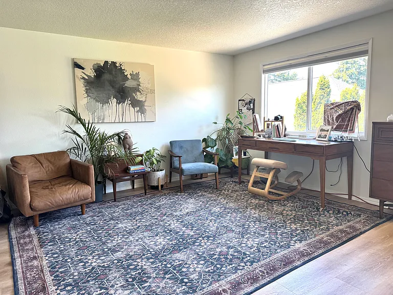 Extra-large primary bedroom with walk-in closet and territorial views