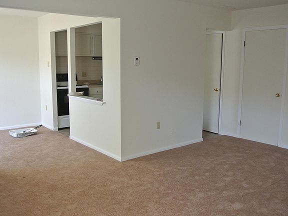Living room/dining area leading into the kitchen