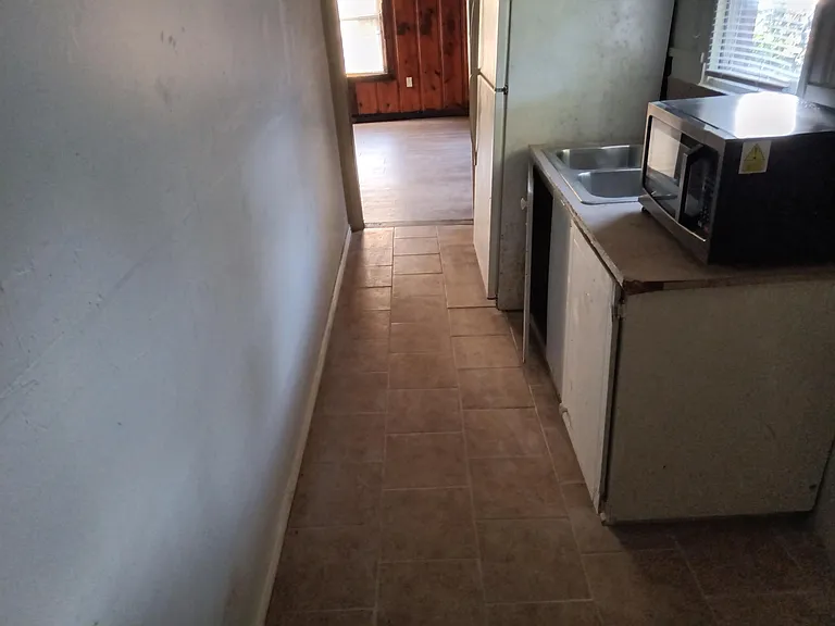 Kitchen with stove and fridge