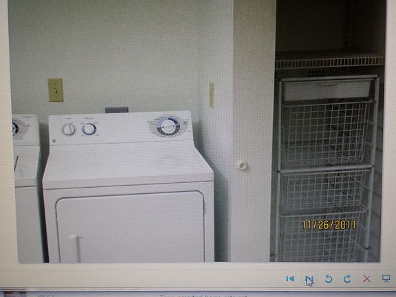 Washer, dryer and storage shelves