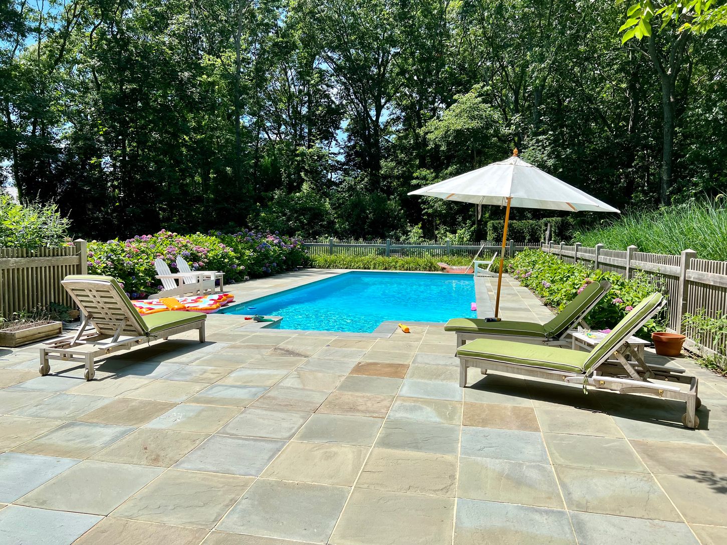  pool area with large patio
