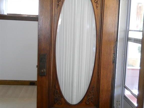Exceptional entry door with interesting details.