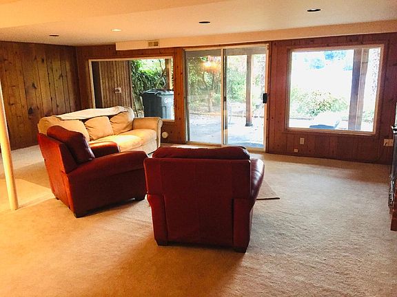 Downstairs family room with 
covered patio and storage
