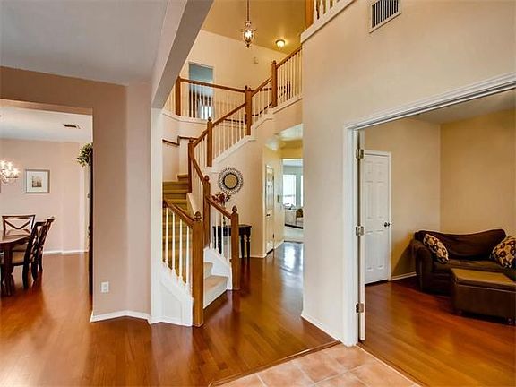 From the foyer, you can see light streaming in from every direction