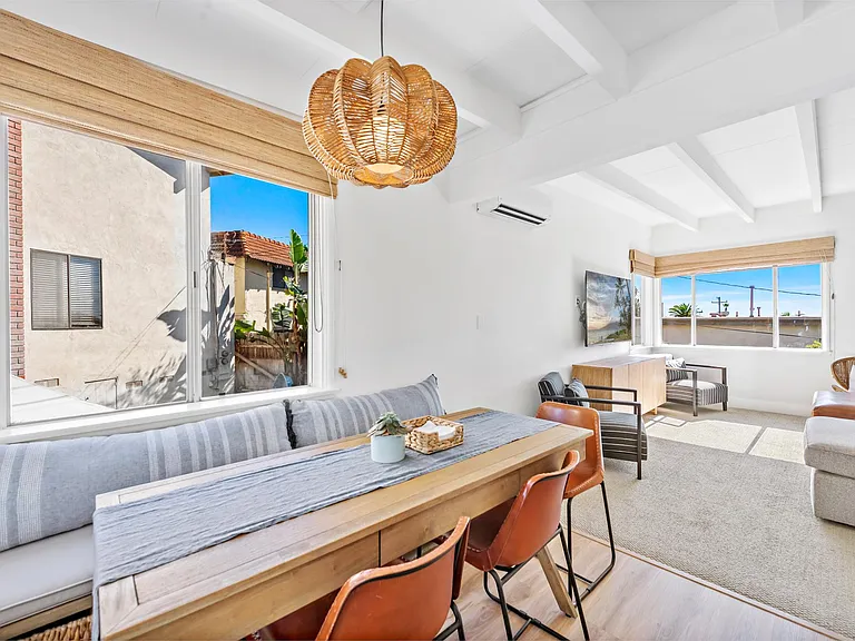 Bench seating and chairs, storage in baskets under bench, plus plenty of storage in tv console and kitchen
