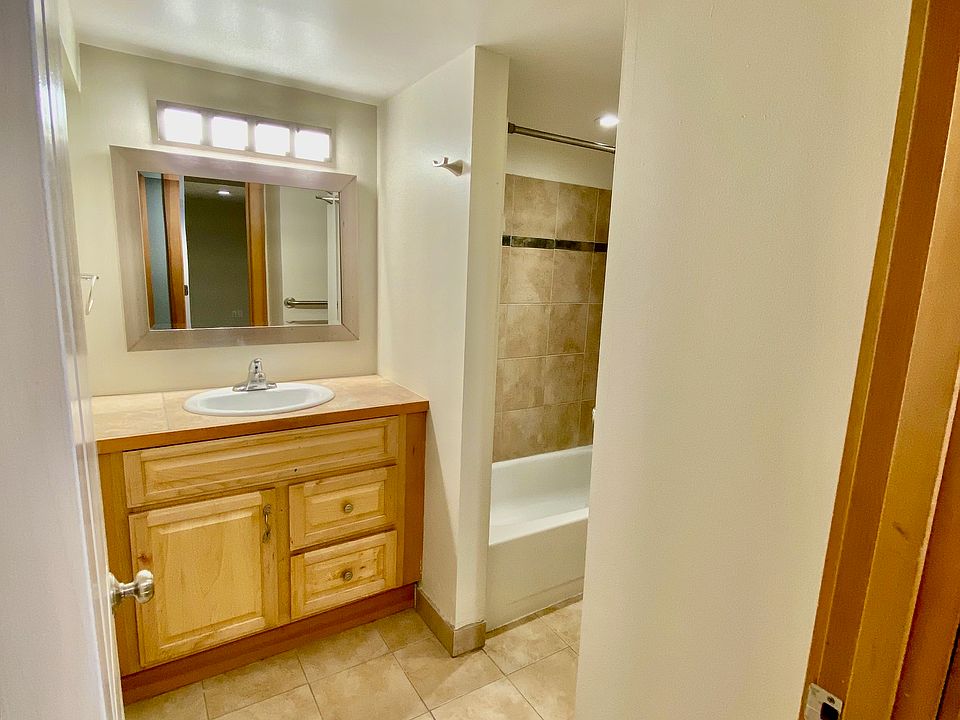 Bathroom with tiled shower