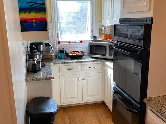 Double stove and extra cabinets in kitchen