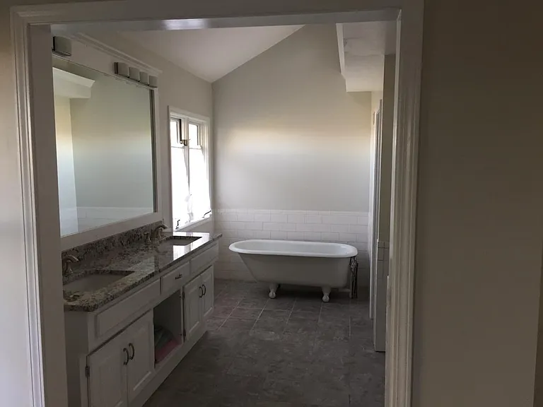 From M. bedroom looking into bathroom