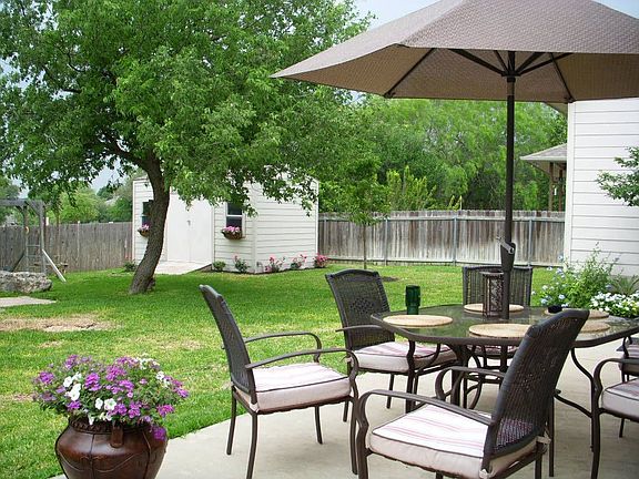 Spacious, landscaped yard w/ sprinkler.