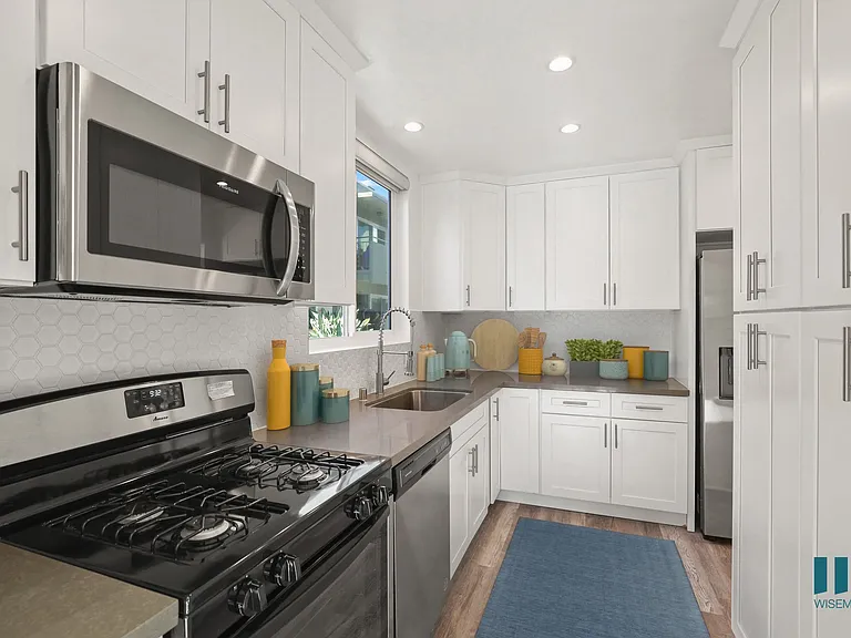 Kitchen with Energy-Efficient Appliances and Ample Cabinet Storage