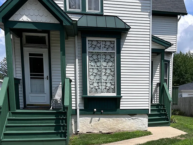 Front of house - lower unit is to the right side
