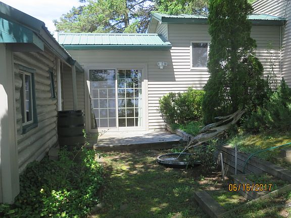 Breezeway, deck, waterfall.