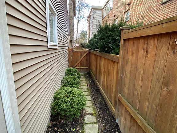 Walkway from front door to driveway and garage