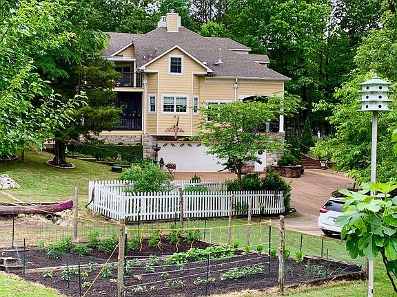 View of renters upper bathroom window from across the garden