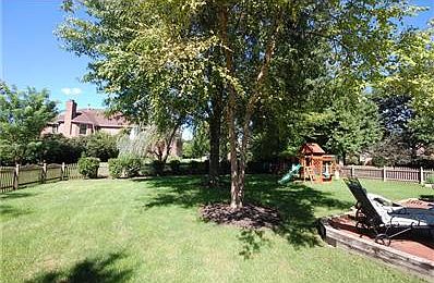 Spacious yard with mature trees