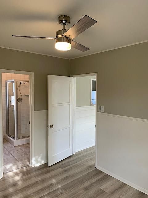 Bedroom ceiling fan and attached bathroom