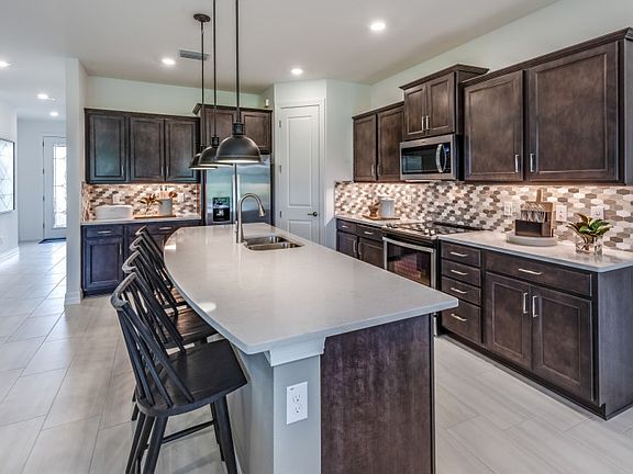 Kitchen with Island for Meal Planning at Home or Entertaining with Friends