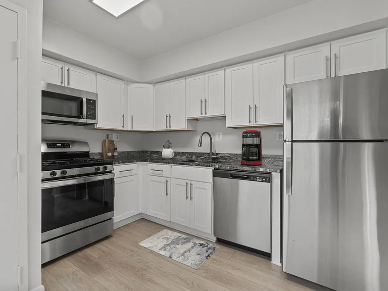 Updated Kitchen with Stainless Steel, Gas Cooking and modern cabinetry