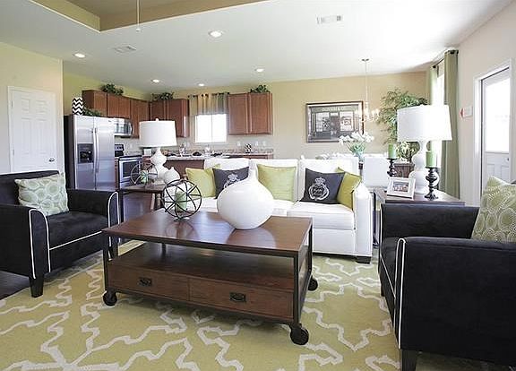 Photo of Model Home with Same Floor Plan, Not of Actual Home Listed