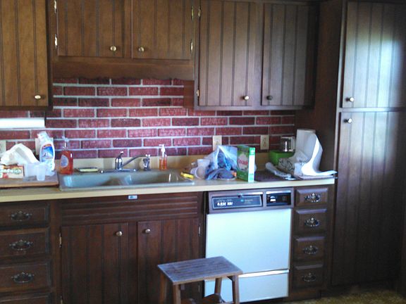 Kitchen. The house does come with a refrigerator.