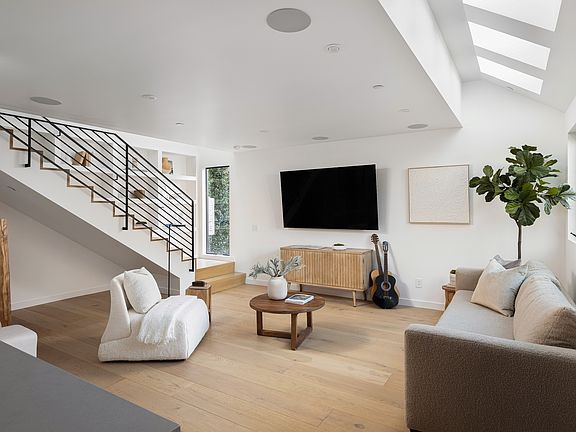 Bright open floorplan. Skylights throughout and modern architectural features. High end Origin Acoustics speakers throughout. Control4 home automation.