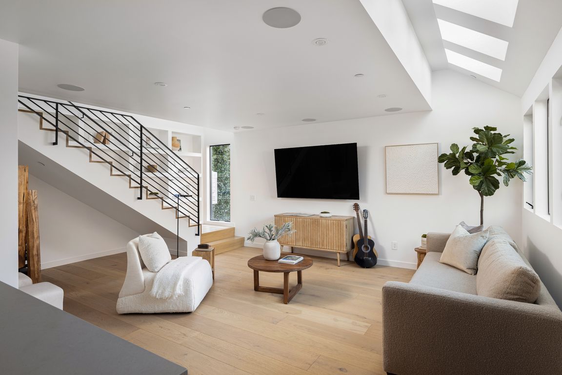 Bright open floorplan. Skylights throughout and modern architectural features. High end Origin Acoustics speakers throughout. Control4 home automation.