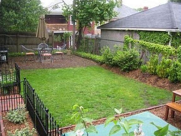 Right side fence no longer there, no furniture currently in back yard