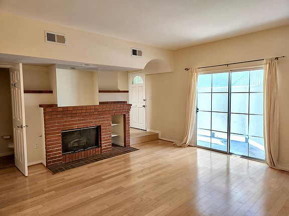 1st Floor - Living Room, 1/2 Bath & Patio