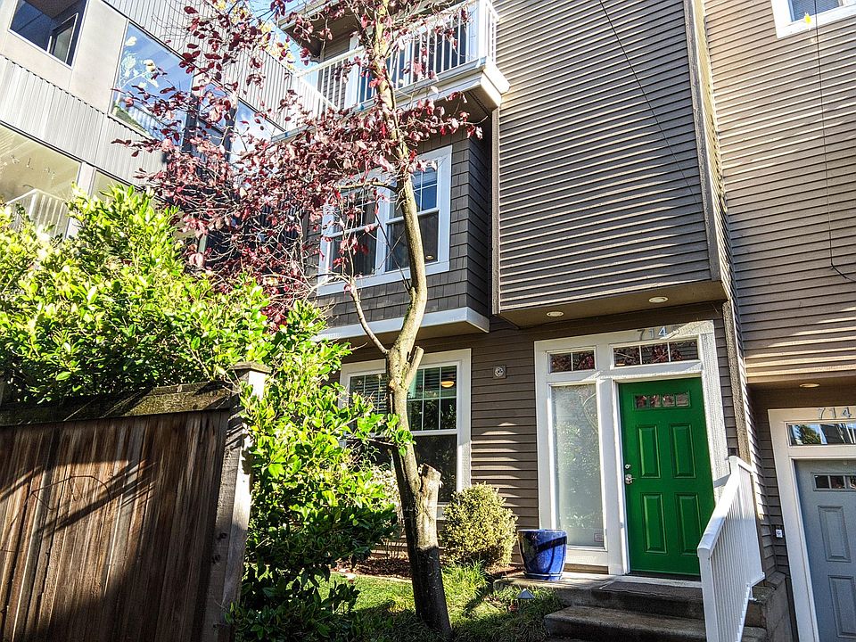 Front door, yard to the left.