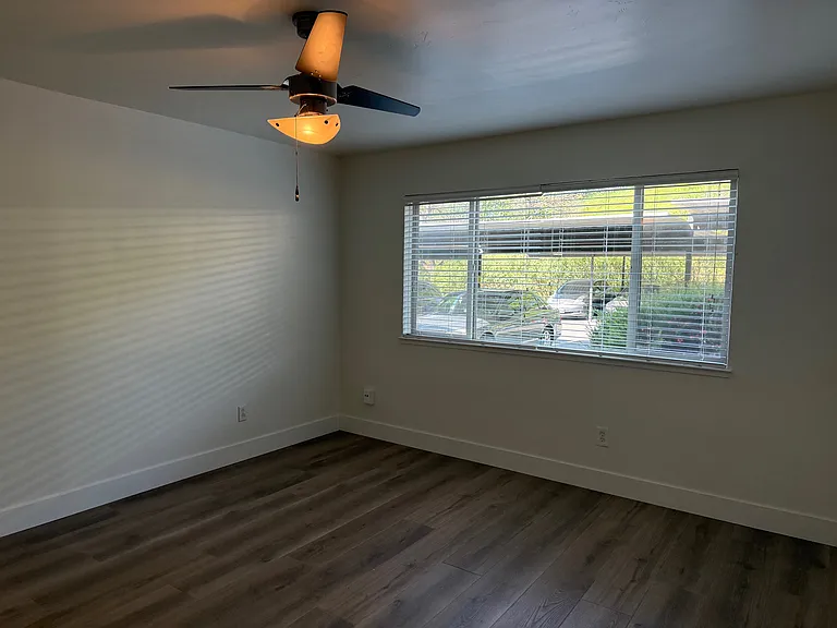 Bedroom with front facing window