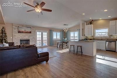 Great room with vaulted ceiling, walk out to deck and lots of light!